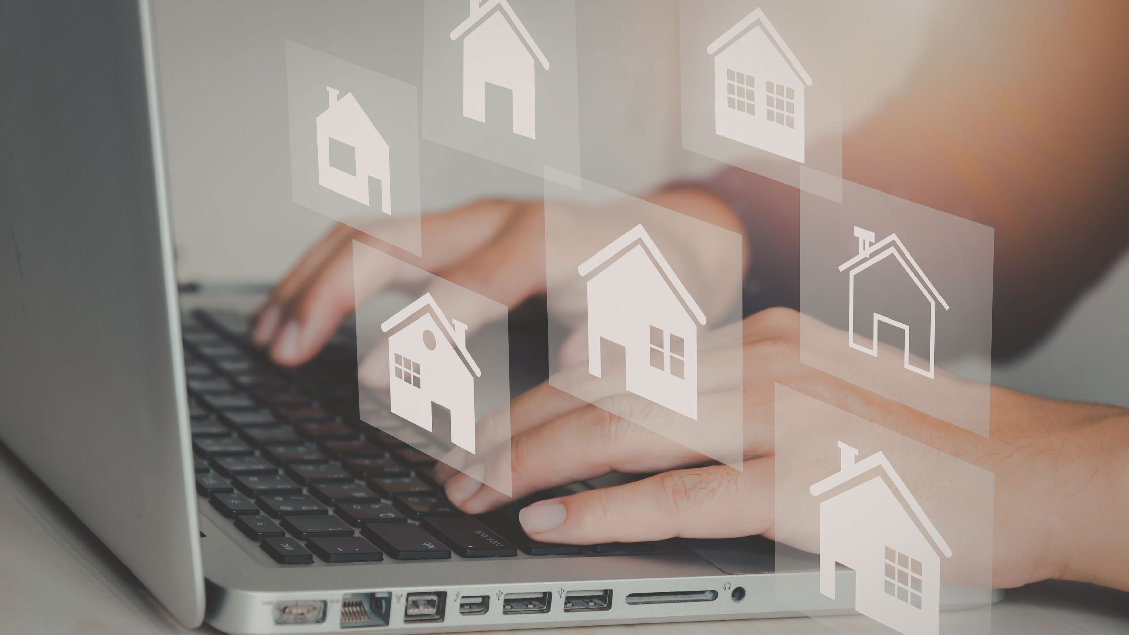 Real estate agent reviewing property listing analytics dashboard on laptop to track buyer interest and improve lead generation for realtors.